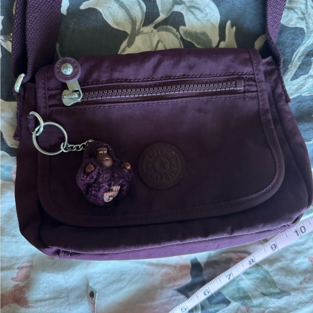 Kipling Plum Crossbody Bag with Silver Hardware and Charm